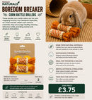 Rabbit pushing and chewing natural corn rattle rollers inside a safe indoor play area.